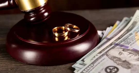 gavel, rings, and money